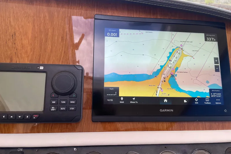  Yacht Photos Pics Navigation system on 2006 Marlow 375 Prowler Classic with Garmin and Simrad displays.