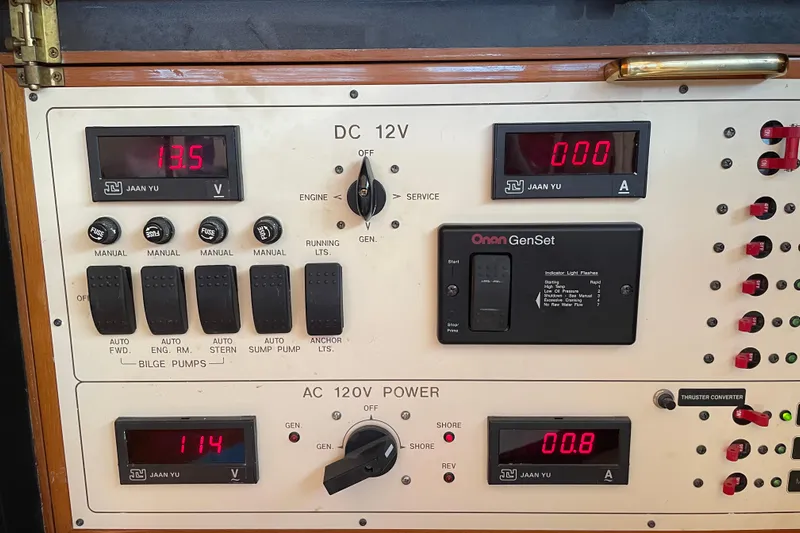  Yacht Photos Pics Control panel of a 2006 Marlow 375 Prowler Classic boat, displaying voltage and amperage.