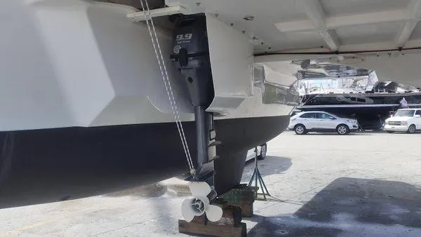 Makani Yacht Photos Pics Seawind 1000 XL 2008 catamaran with outboard motor in dry dock.