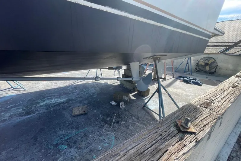 The Lucky Dreamers Yacht Photos Pics 2005 Novatec 48 Cockpit Motor Yacht on dry dock, showing propeller and hull.