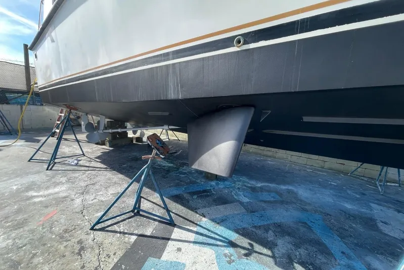 The Lucky Dreamers Yacht Photos Pics 2005 Novatec 48 Cockpit Motor Yacht on stands, showing hull and rudder details.