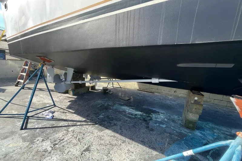 The Lucky Dreamers Yacht Photos Pics 2005 Novatec 48 Cockpit Motor Yacht hull and propellers on dry dock.