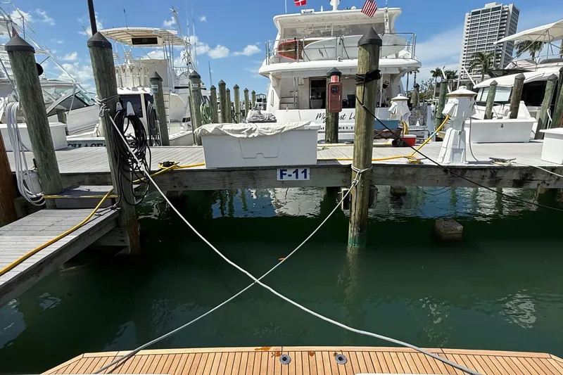  Yacht Photos Pics Beneteau Swift Trawler 35, 2021 model, docked at marina with clear blue sky.