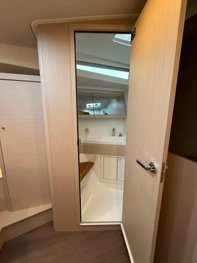 Archimedes Yacht Photos Pics Interior view of 2022 Beneteau Oceanis 46.1 yacht bathroom with modern fixtures.