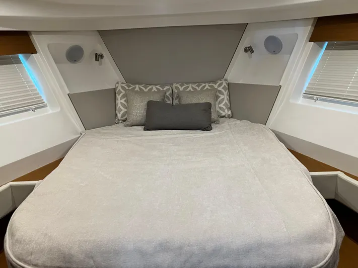  Yacht Photos Pics Beneteau Swift Trawler 35 2021 master bedroom with modern decor and comfortable bedding.