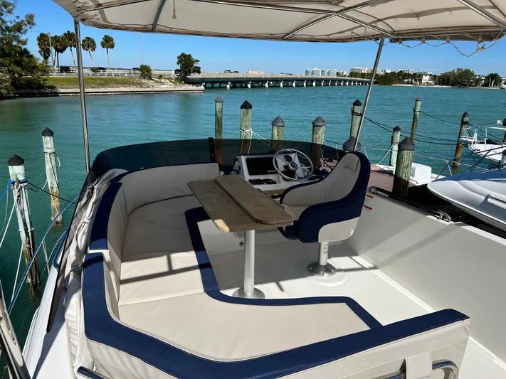  Yacht Photos Pics Flybridge of 2021 Beneteau Swift Trawler 35 with seating and helm station.