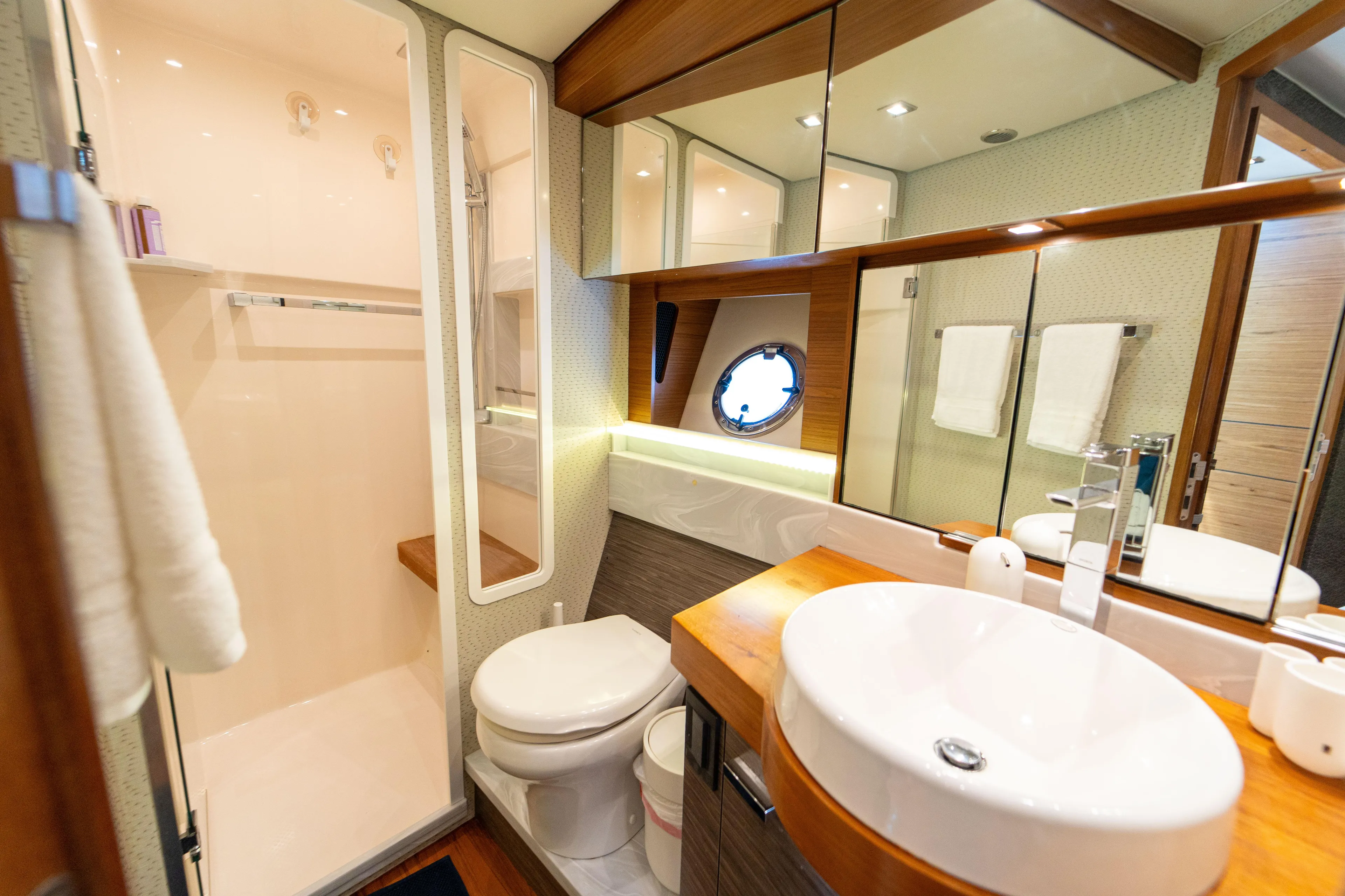  Yacht Photos Pics Luxurious bathroom in 2019 Tiara Yachts F44 Flybridge with modern fixtures and elegant design.