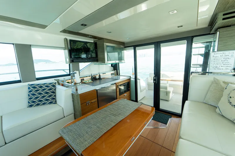  Yacht Photos Pics Luxurious interior of 2019 Tiara Yachts F44 Flybridge with modern seating and elegant decor.