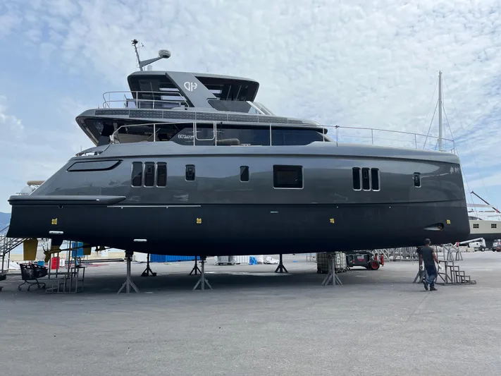  Yacht Photos Pics 2024 Sunreef 60 Eco yacht on display, showcasing sleek design and modern features.