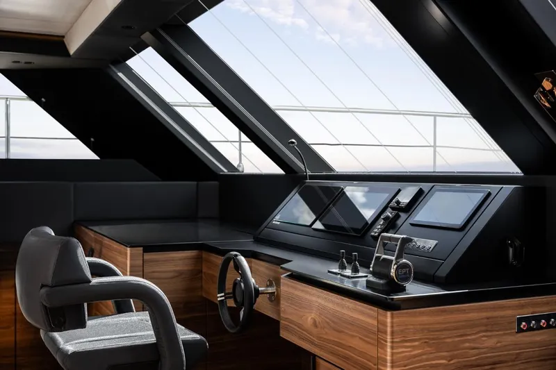  Yacht Photos Pics Helm of 2024 Sunreef 60 Eco yacht with modern controls and panoramic windows.