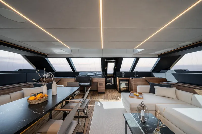  Yacht Photos Pics Luxurious interior of 2024 Sunreef 60 Eco yacht with modern furnishings and elegant design.