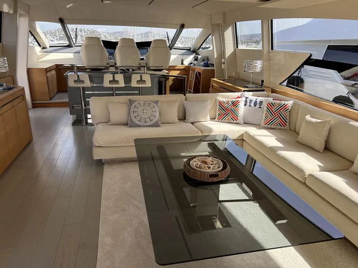  Yacht Photos Pics Luxurious interior of a 2012 Pershing 92 yacht with modern seating and helm.