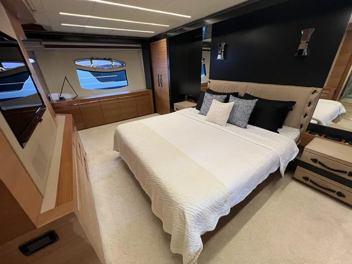  Yacht Photos Pics Luxurious bedroom interior of 2012 Pershing 92 yacht with modern design and elegant furnishings.