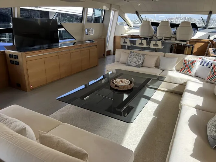  Yacht Photos Pics Luxurious interior of a 2012 Pershing 92 yacht with modern furnishings and elegant design.