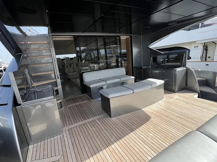  Yacht Photos Pics Luxurious 2012 Pershing 92 yacht deck with modern seating and sleek design.