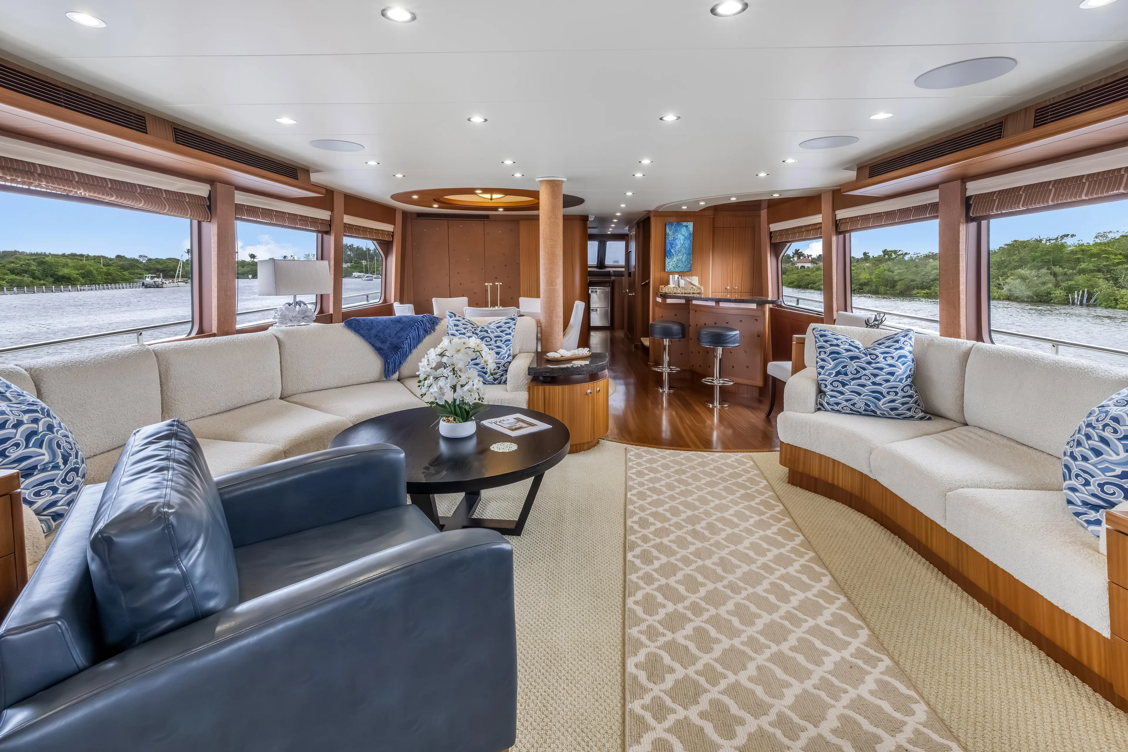 Jus Chill'n Yacht Photos Pics Luxurious interior of 2012 Cheoy Lee 84 Bravo yacht with elegant seating and decor.