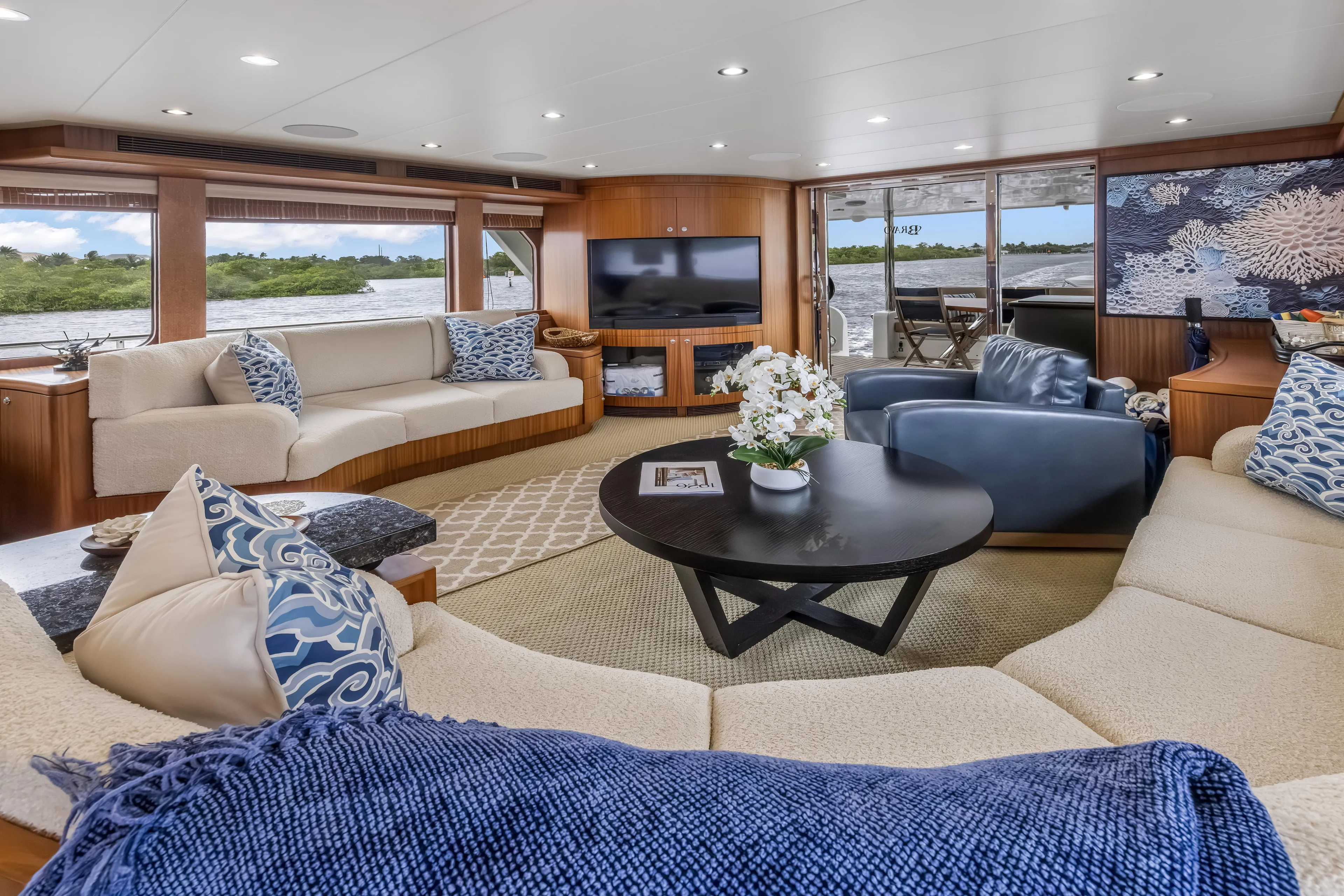 Jus Chill'n Yacht Photos Pics Luxurious interior of 2012 Cheoy Lee 84 Bravo yacht with elegant seating and decor.