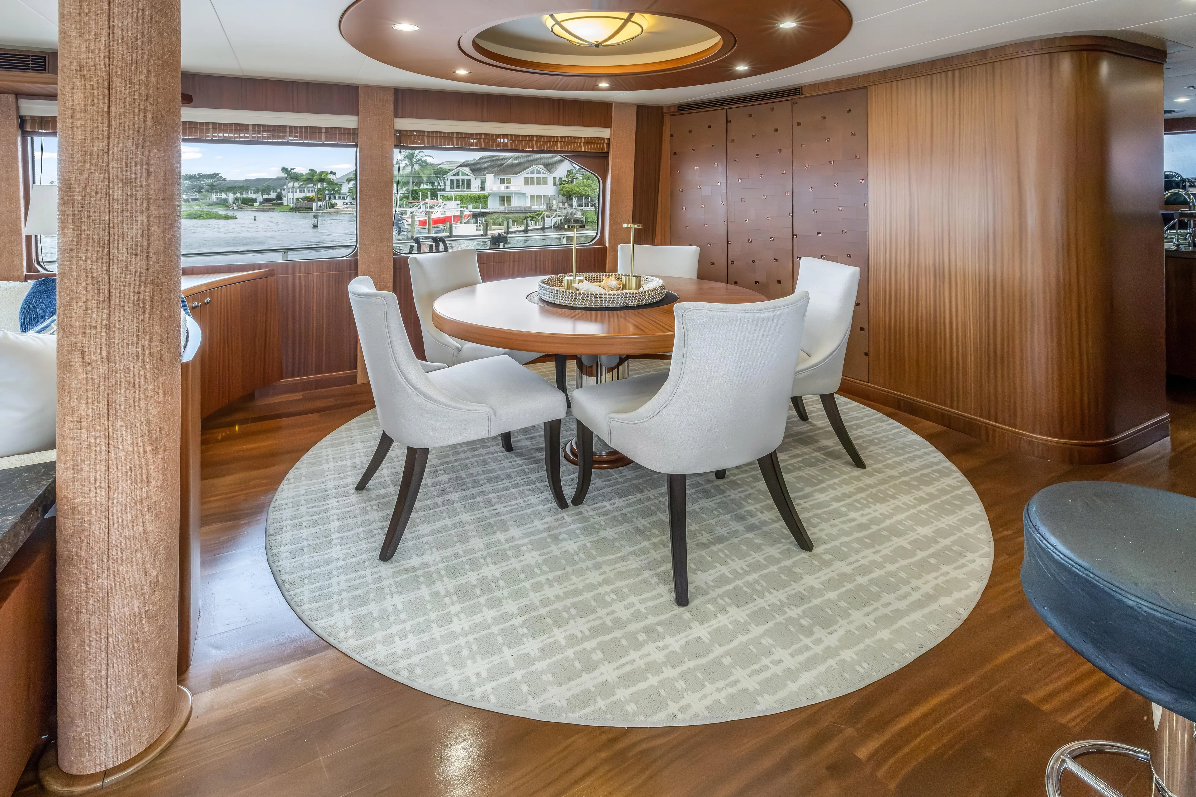 Jus Chill'n Yacht Photos Pics Luxurious dining area on 2012 Cheoy Lee 84 Bravo yacht with elegant furnishings.