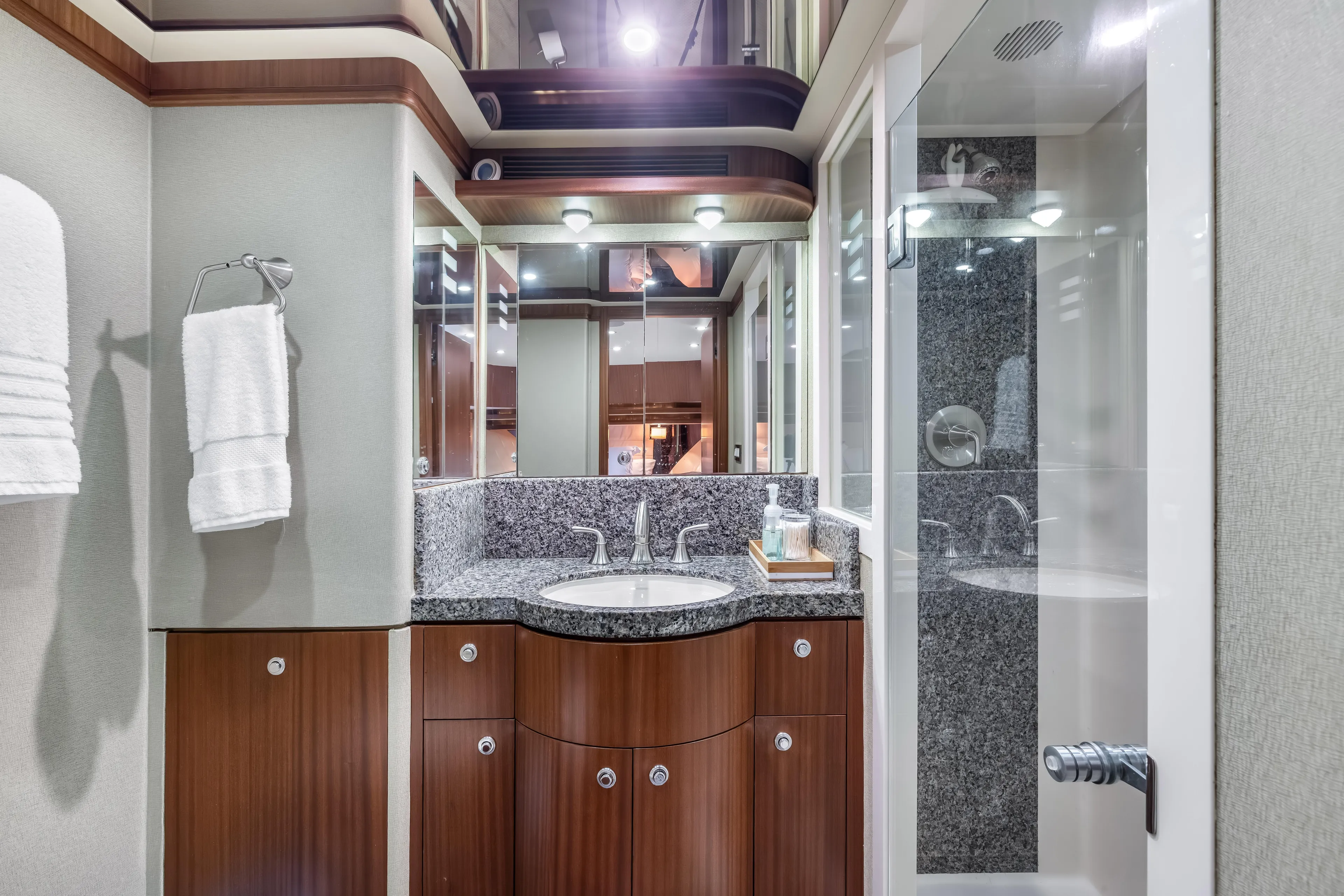 Jus Chill'n Yacht Photos Pics Luxurious bathroom interior of 2012 Cheoy Lee 84 Bravo yacht with modern fixtures.