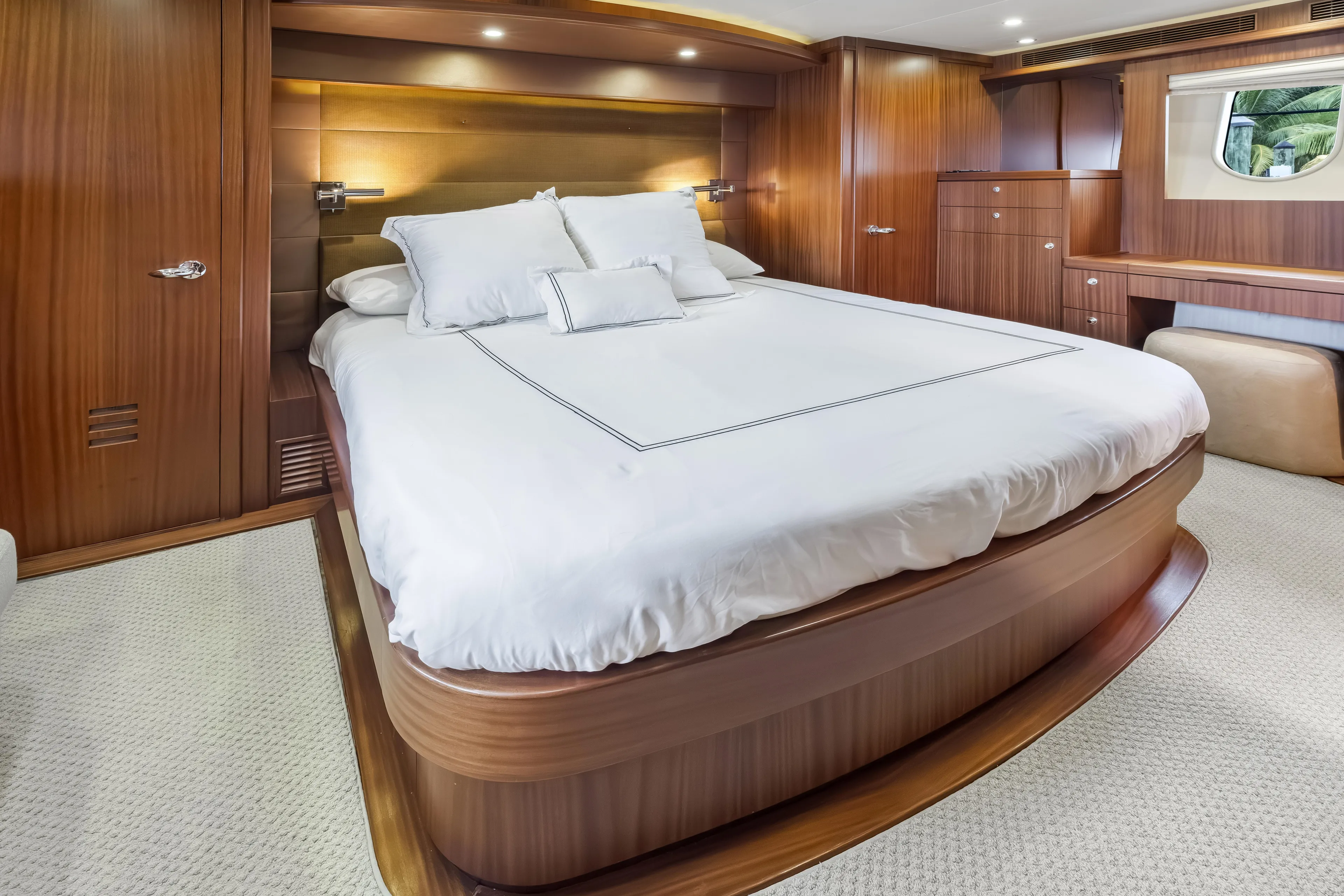 Jus Chill'n Yacht Photos Pics Luxurious bedroom interior of 2012 Cheoy Lee 84 Bravo yacht with elegant wood finish.