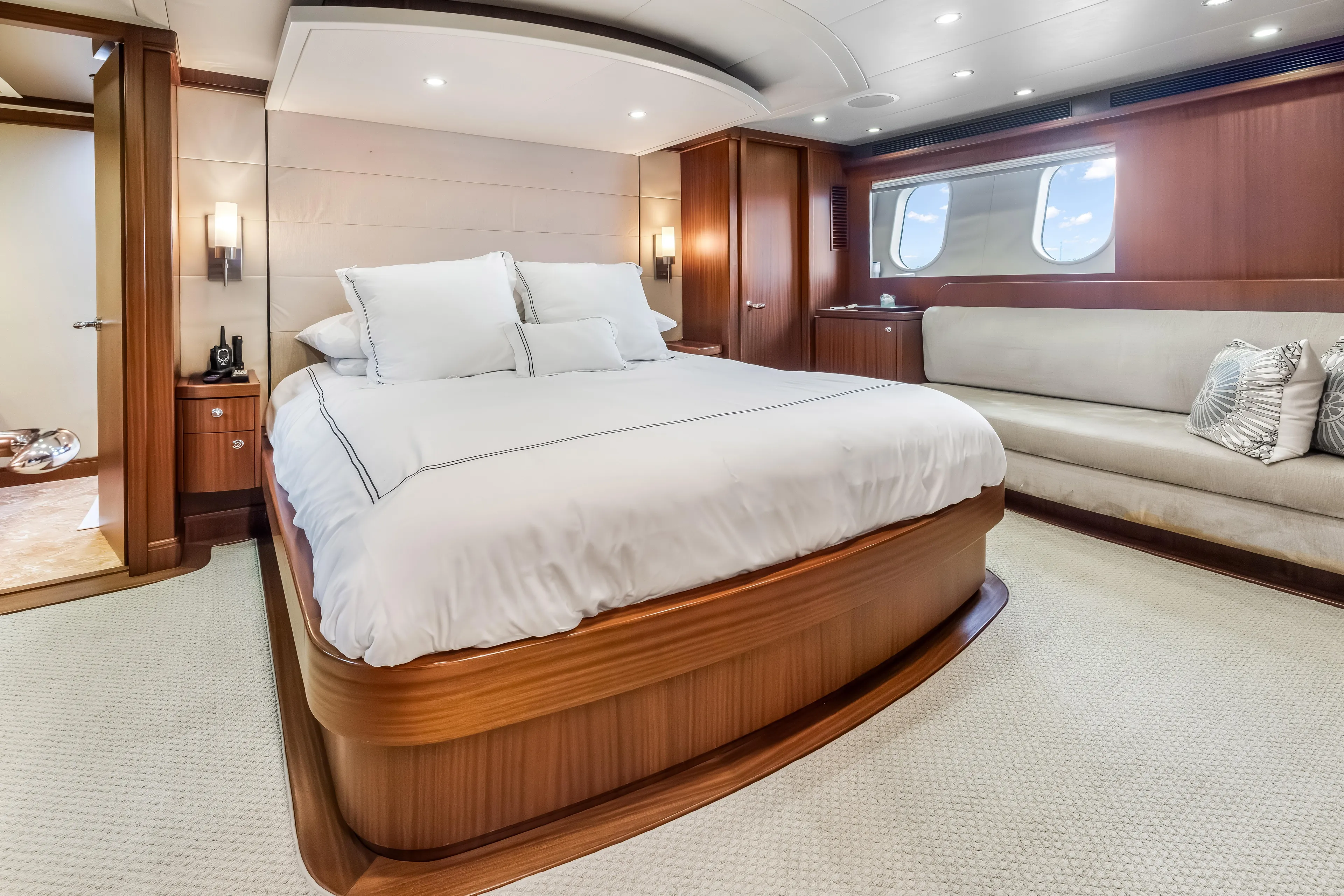Jus Chill'n Yacht Photos Pics Luxurious bedroom interior of 2012 Cheoy Lee 84 Bravo yacht with elegant wood finishes.