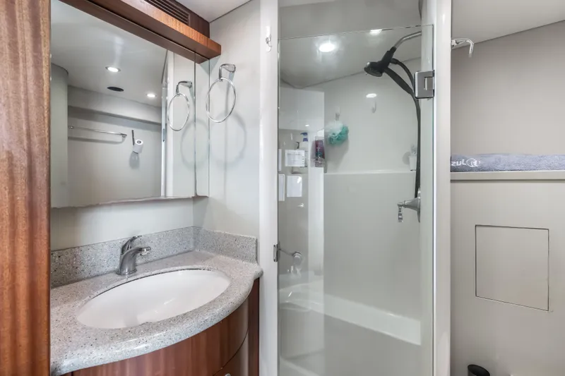 Jus Chill'n Yacht Photos Pics Luxurious bathroom in 2012 Cheoy Lee 84 Bravo yacht with modern fixtures and glass shower.