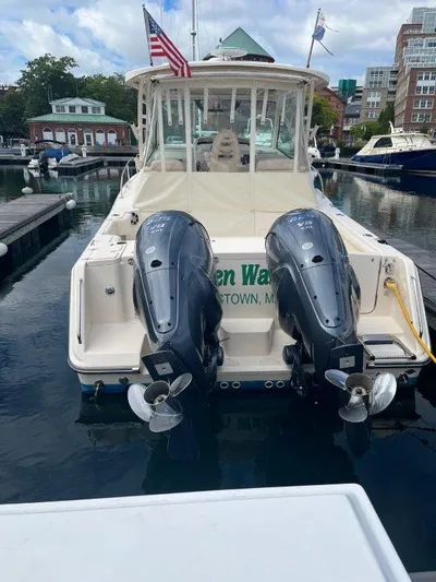  Yacht Photos Pics 2020 Grady-White Express 330 boat docked with twin outboard engines.
