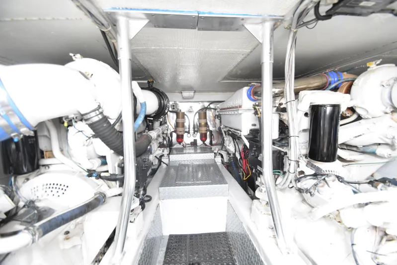 Event Horizon Yacht Photos Pics Engine room of 2000 Ocean Yachts 48 Super Sport, showcasing mechanical components and systems.