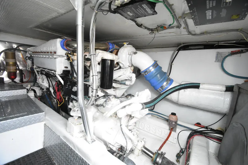 Event Horizon Yacht Photos Pics Engine room of 2000 Ocean Yachts 48 Super Sport, showcasing mechanical components and wiring.
