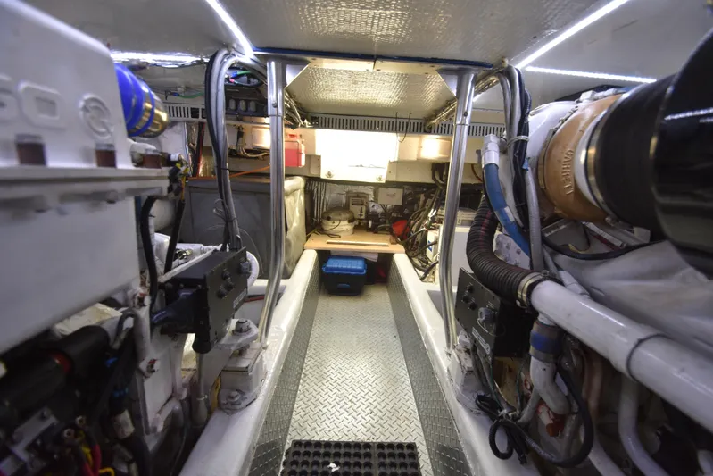 Event Horizon Yacht Photos Pics Engine room of 2000 Ocean Yachts 48 Super Sport, showcasing mechanical components and equipment.