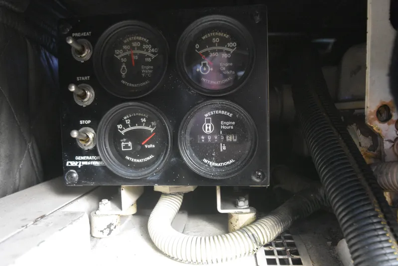 Event Horizon Yacht Photos Pics Control panel of a 2000 Ocean Yachts 48 Super Sport, featuring gauges and switches.