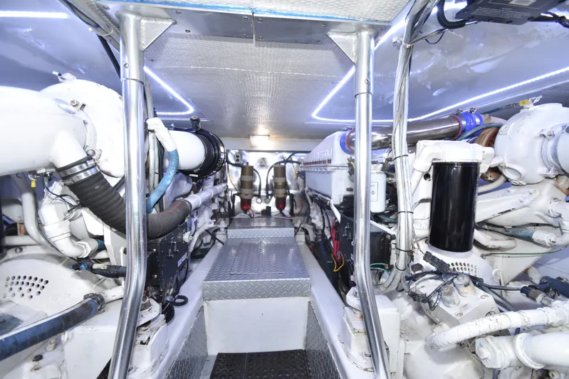 Event Horizon Yacht Photos Pics Engine room of 2000 Ocean Yachts 48 Super Sport, showcasing mechanical components and systems.
