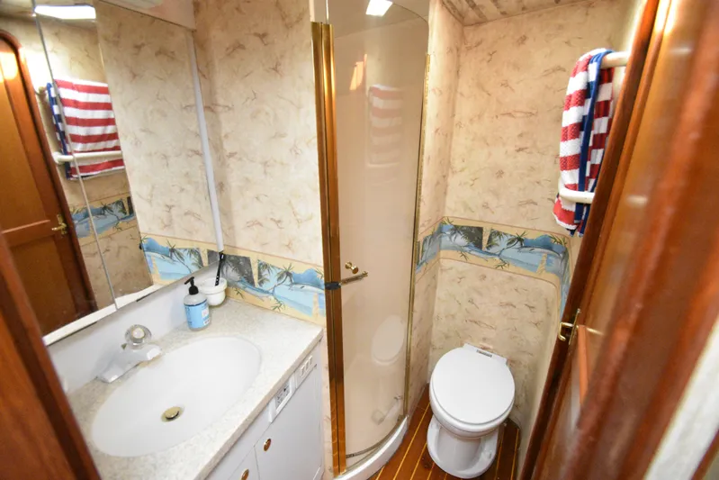 Event Horizon Yacht Photos Pics Bathroom interior of 2000 Ocean Yachts 48 Super Sport with shower and sink.