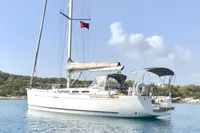 Sailing yacht Dufour 45E Performance 2009 anchored in calm waters.