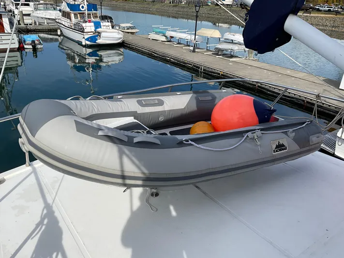 Mariposa Yacht Photos Pics Inflatable dinghy on Integrity 45 yacht, docked at marina, 2012 model.