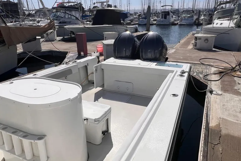 Sd Jam Yacht Photos Pics 2023 Parker 2820 XLD Sport Cabin boat docked at marina with twin engines.