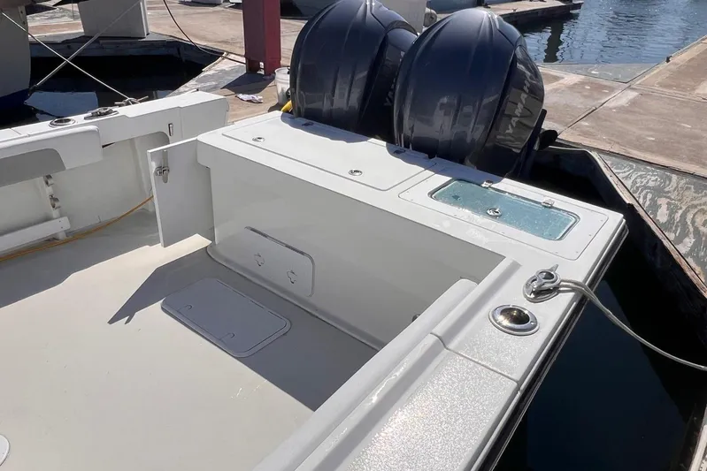 Sd Jam Yacht Photos Pics 2023 Parker 2820 XLD Sport Cabin boat with dual outboard motors at dock.