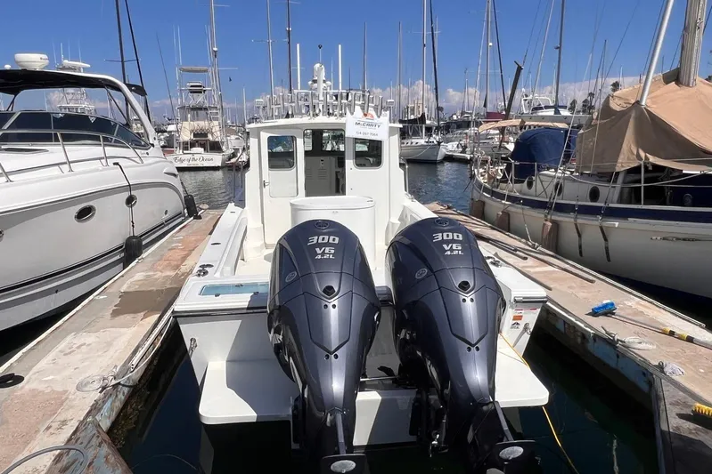 Sd Jam Yacht Photos Pics 2023 Parker 2820 XLD Sport Cabin boat docked with twin 300 V6 engines.
