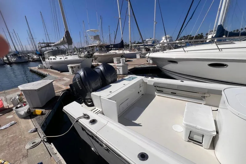 Sd Jam Yacht Photos Pics 2023 Parker 2820 XLD Sport Cabin boat docked at marina with twin Yamaha engines.
