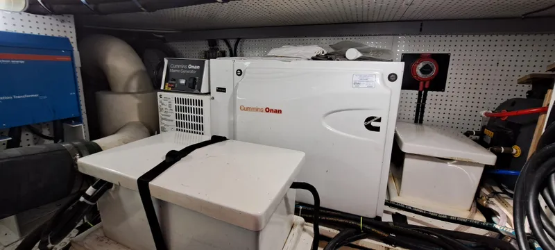 Mariposa Yacht Photos Pics Integrity 45 2012 engine room with Cummins Onan generator and equipment.