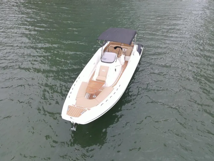 Hoko Yacht Photos Pics 2017 Nuova Jolly Princess boat with canopy on calm water.