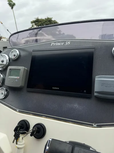 Hoko Yacht Photos Pics Control panel of a 2017 Nuova Jolly Princess 38 boat with navigation instruments.