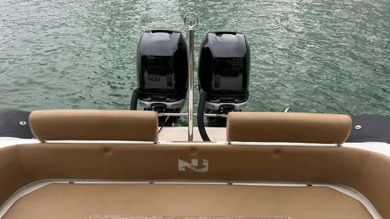 Hoko Yacht Photos Pics 2017 Nuova Jolly Princess boat with dual outboard motors on water.