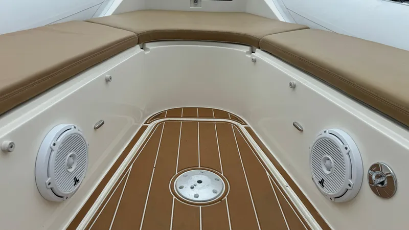 Hoko Yacht Photos Pics 2017 Nuova Jolly Princess boat interior with cushioned seating and marine speakers.