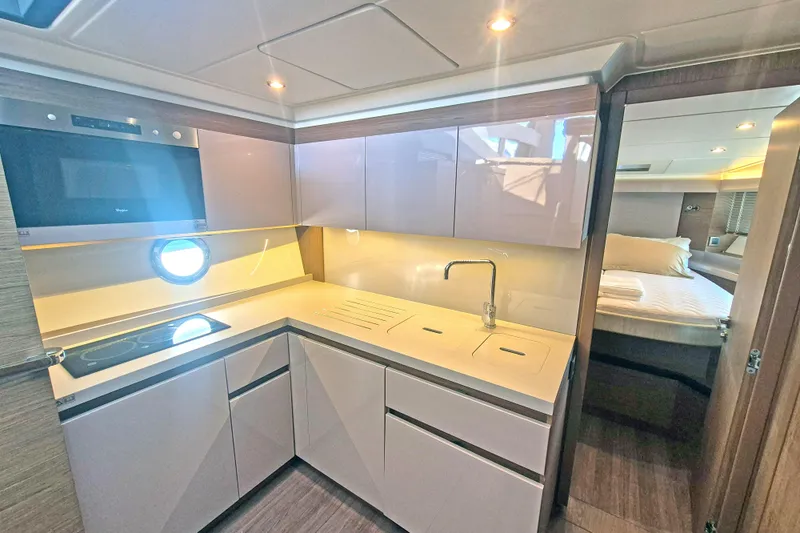  Yacht Photos Pics Luxurious kitchen interior of 2019 Beneteau Gran Turismo 50 Sportfly yacht.