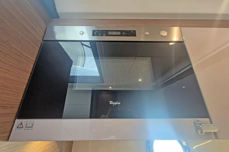  Yacht Photos Pics Whirlpool microwave in 2019 Beneteau Gran Turismo 50 Sportfly yacht kitchen.