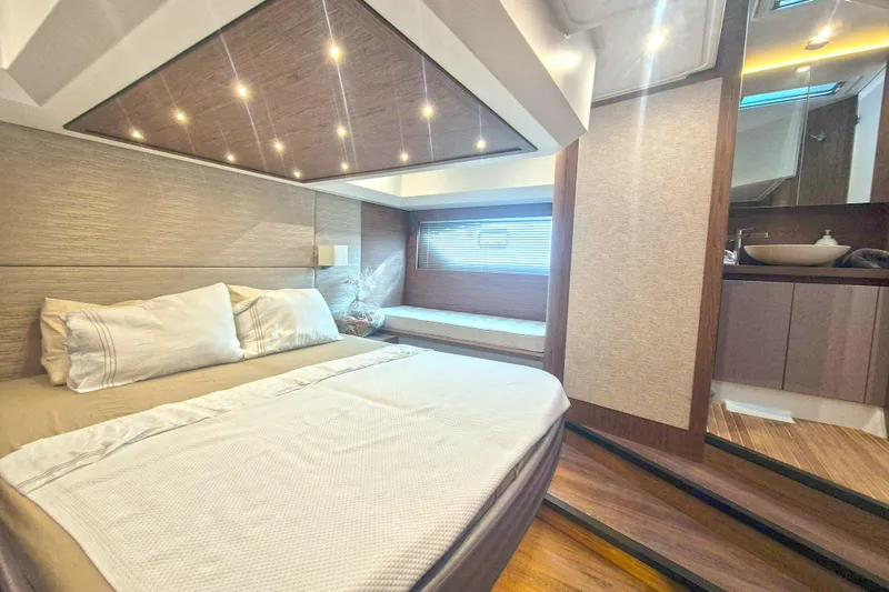  Yacht Photos Pics Luxurious bedroom interior of 2019 Beneteau Gran Turismo 50 Sportfly yacht.