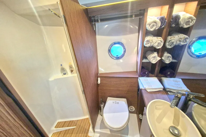  Yacht Photos Pics Luxurious bathroom in 2019 Beneteau Gran Turismo 50 Sportfly yacht with modern amenities.