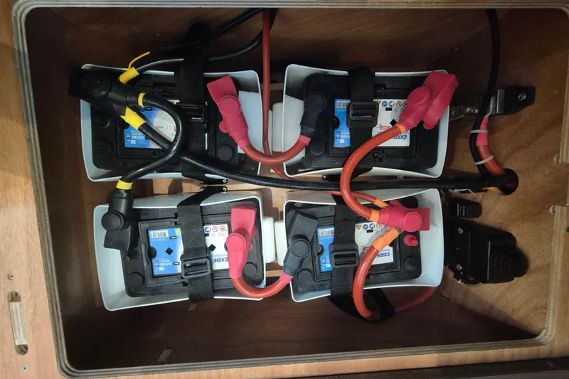  Yacht Photos Pics Battery compartment of 2019 Beneteau Gran Turismo 50 Sportfly with secured connections.