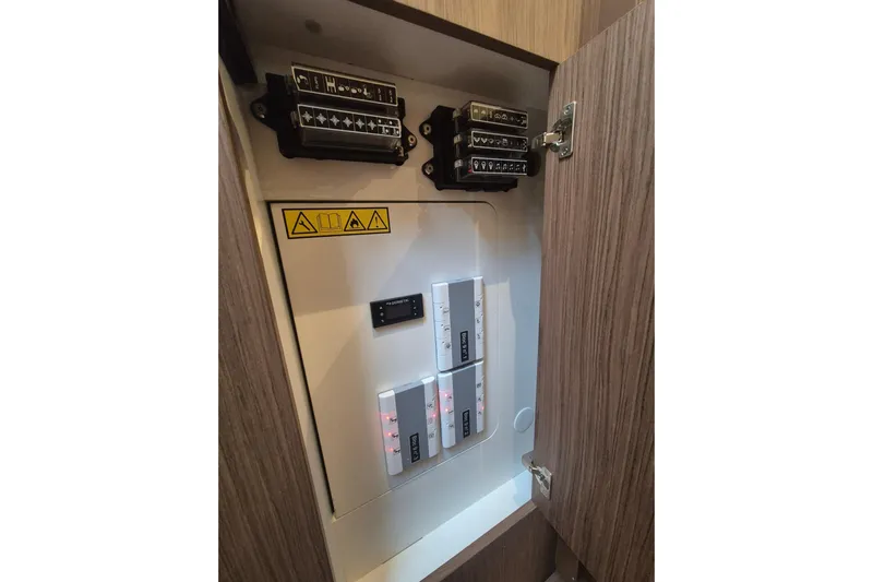  Yacht Photos Pics Electrical panel inside 2019 Beneteau Gran Turismo 50 Sportfly yacht cabinet.